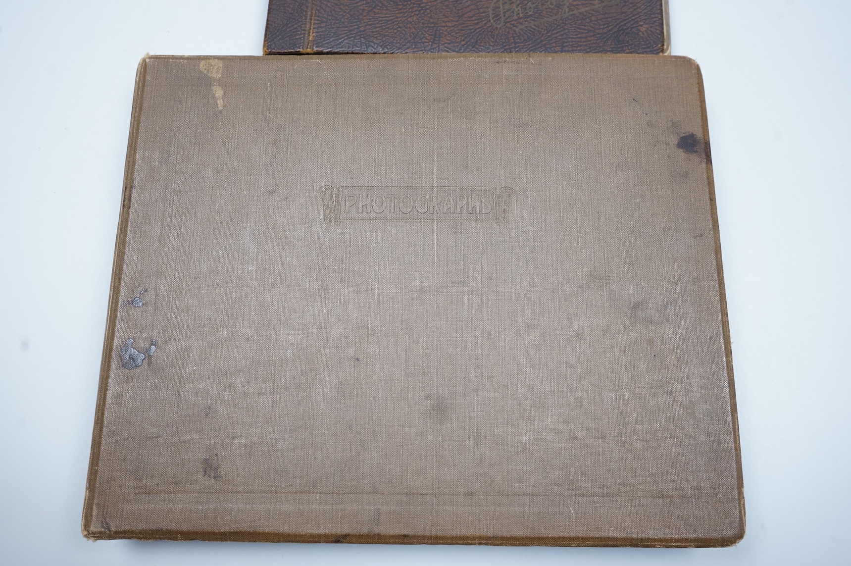 Two WWII naval photo albums, containing an archive of 1940s photographs of the Russian convoy in the Barents Sea, a ship’s concert at Scarpa Flow, a variety of Royal Naval vessels and some aircraft, images aboard HMS Peg